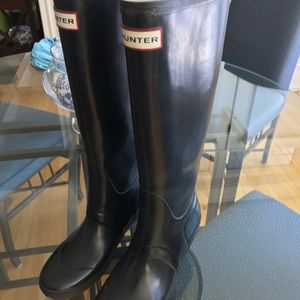 Hunter boots.  Black with wedge